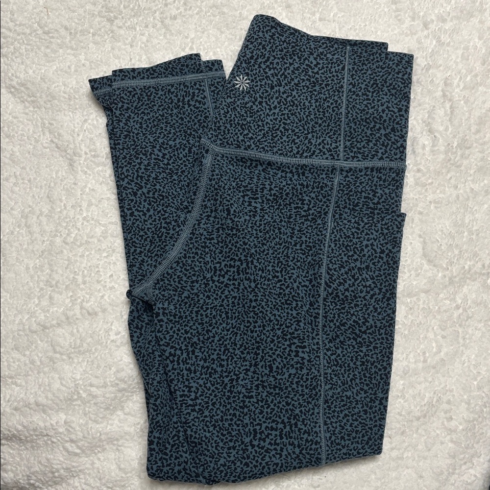 Two pair of Athleta stash- pocket leggings - Picture 2 of 5